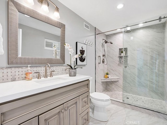 31062 Flying Cloud Dr, Laguna Niguel, CA 92677 - bathroom featuring visible vents, marble finish floor, vanity, and a shower stall