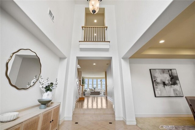 2438 Vista Del Sol Ln, Verne, CA 91750 - foyer featuring visible vents, baseboards, a high ceiling, recessed lighting, and light tile patterned floors