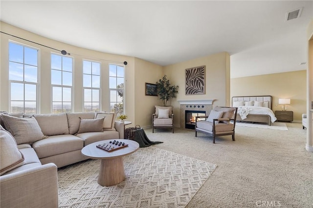 2438 Vista Del Sol Ln, Verne, CA 91750 - living room featuring a multi sided fireplace, carpet flooring, and visible vents