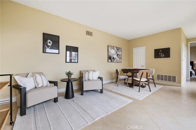 2438 Vista Del Sol Ln, Verne, CA 91750 - sitting room with baseboards, visible vents, and light tile patterned floors