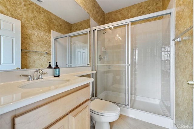 2438 Vista Del Sol Ln, Verne, CA 91750 - full bath with vanity, tile patterned floors, a shower stall, and toilet