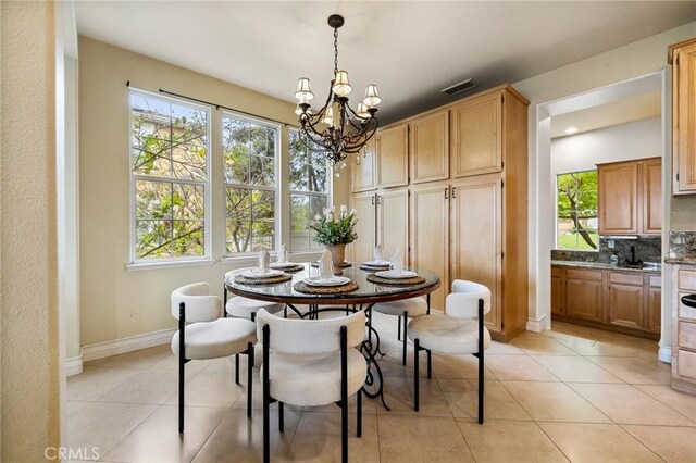 2438 Vista Del Sol Ln, Verne, CA 91750 - dining area with baseboards, visible vents, light tile patterned flooring, and a chandelier