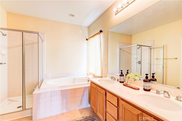 2438 Vista Del Sol Ln, Verne, CA 91750 - full bath featuring a sink, a bath, and a stall shower