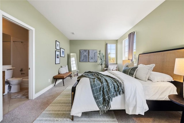 2438 Vista Del Sol Ln, Verne, CA 91750 - carpeted bedroom with baseboards and ensuite bath