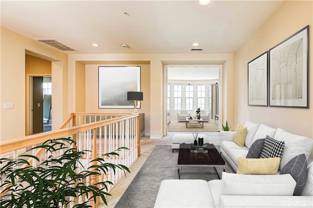 2438 Vista Del Sol Ln, Verne, CA 91750 - carpeted living room with recessed lighting, baseboards, and visible vents