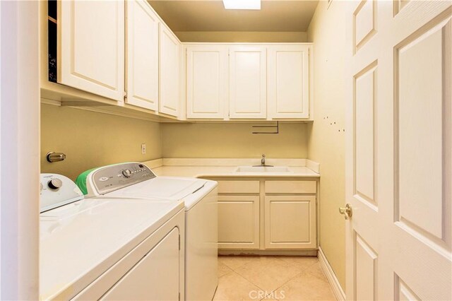 2438 Vista Del Sol Ln, Verne, CA 91750 - clothes washing area featuring cabinet space, separate washer and dryer, light tile patterned flooring, and a sink