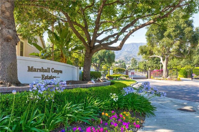2438 Vista Del Sol Ln, Verne, CA 91750 - community sign featuring a gate and a mountain view