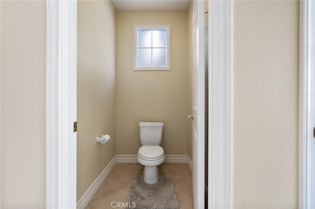 2438 Vista Del Sol Ln, Verne, CA 91750 - bathroom with baseboards, tile patterned floors, and toilet