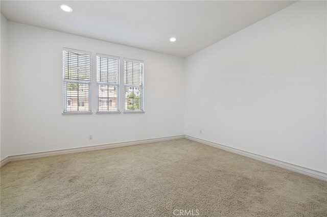 2438 Vista Del Sol Ln, Verne, CA 91750 - carpeted empty room featuring baseboards and recessed lighting