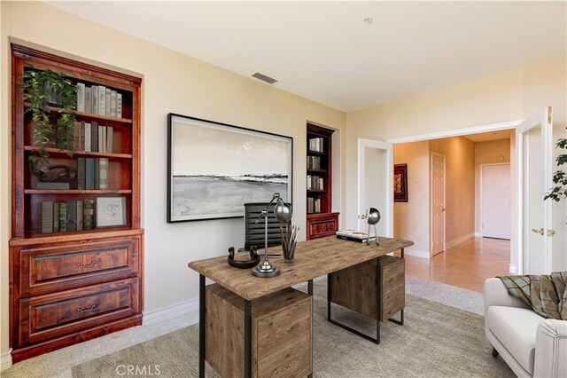 2438 Vista Del Sol Ln, Verne, CA 91750 - office area featuring built in features, baseboards, and visible vents