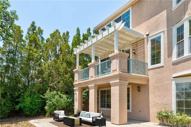 2438 Vista Del Sol Ln, Verne, CA 91750 - rear view of house featuring outdoor lounge area, a pergola, a balcony, a patio, and stucco siding