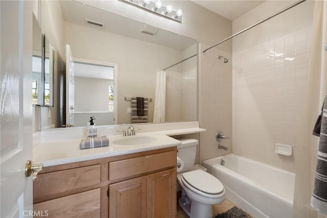 2438 Vista Del Sol Ln, Verne, CA 91750 - full bathroom with vanity, toilet, visible vents, and shower / tub combo with curtain