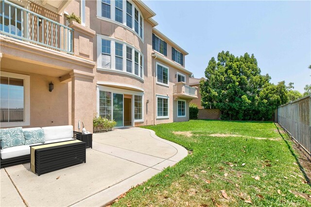 2438 Vista Del Sol Ln, Verne, CA 91750 - exterior space with a patio, a fenced backyard, stucco siding, an outdoor hangout area, and a lawn