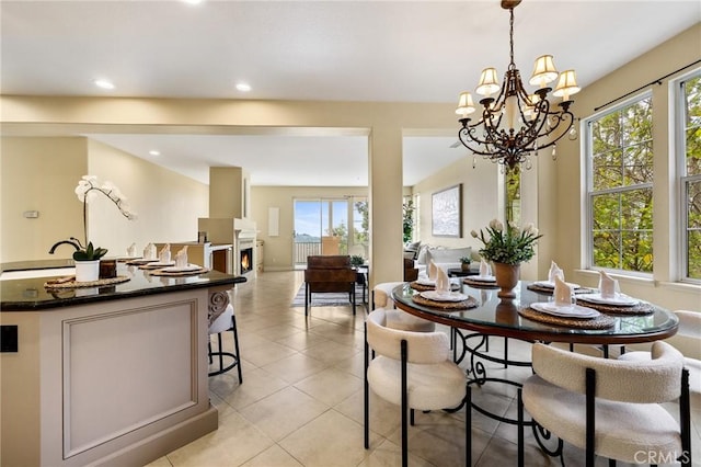 2438 Vista Del Sol Ln, Verne, CA 91750 - dining area featuring recessed lighting, a notable chandelier, light tile patterned flooring, and a wealth of natural light