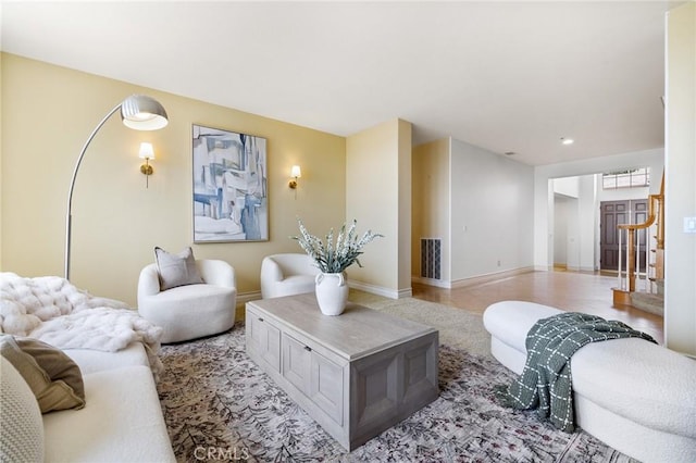 2438 Vista Del Sol Ln, Verne, CA 91750 - living area with stairway, baseboards, recessed lighting, and visible vents