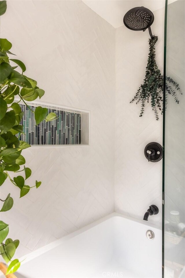 full bath featuring walk in shower