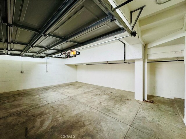 garage featuring a garage door opener