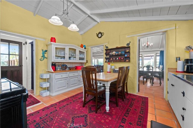28015 Old Mine Rd, Ranchita, CA 92066 - dining area featuring light tile patterned floors, a chandelier, plenty of natural light, and wood ceiling