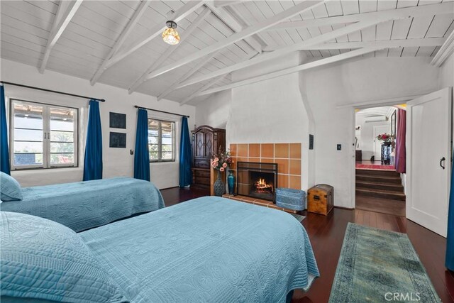 28015 Old Mine Rd, Ranchita, CA 92066 - bedroom featuring wood finished floors, wooden ceiling, and a tile fireplace