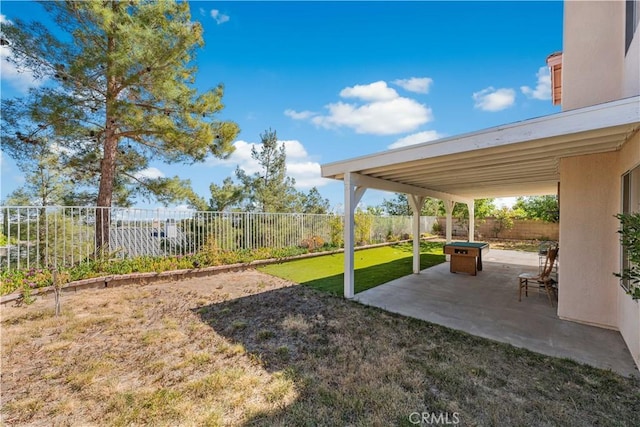 view of yard featuring a patio and a fenced backyard