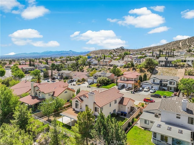 birds eye view of property featuring a residential view and a mountain view