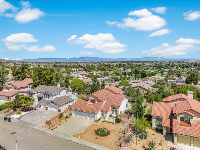 aerial view featuring a residential view and a mountain view