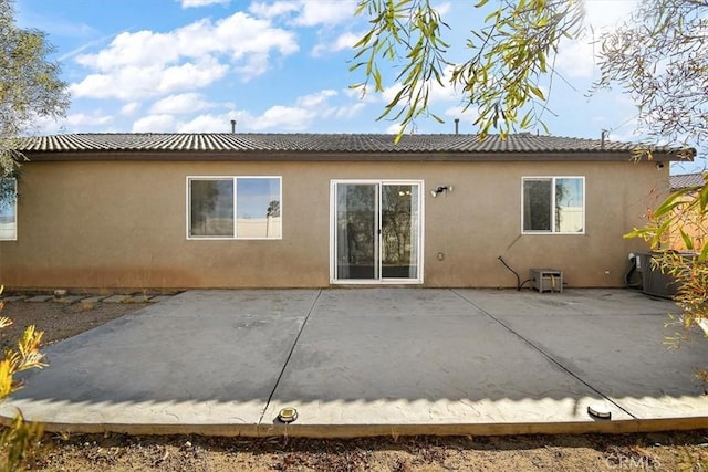 905 Broadway Ave, Barstow, CA 92311 - rear view of house with a patio and stucco siding