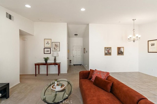 905 Broadway Ave, Barstow, CA 92311 - living room with an inviting chandelier, light colored carpet, recessed lighting, and visible vents