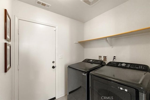905 Broadway Ave, Barstow, CA 92311 - laundry area with baseboards, laundry area, independent washer and dryer, and visible vents