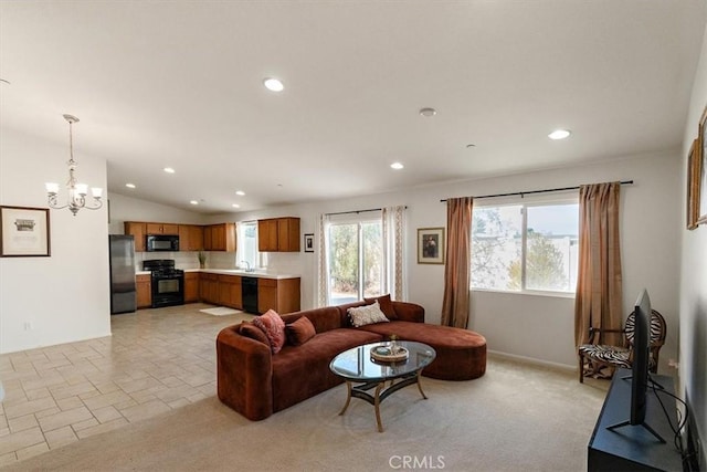 905 Broadway Ave, Barstow, CA 92311 - living room with an inviting chandelier, recessed lighting, and lofted ceiling