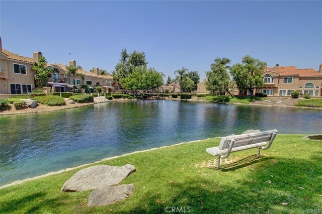 view of water feature with a residential view