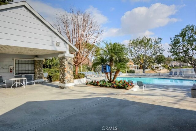 pool with a patio