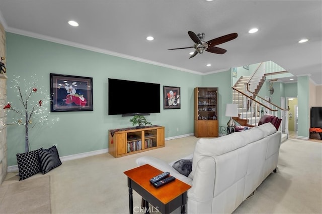 carpeted living area with ceiling fan, stairway, baseboards, ornamental molding, and recessed lighting