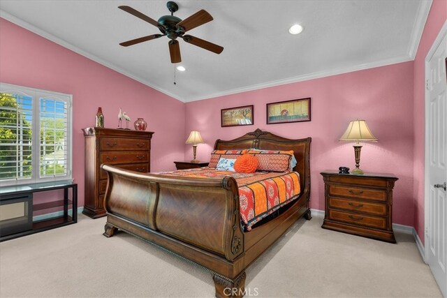 bedroom with carpet floors, ornamental molding, baseboards, and recessed lighting
