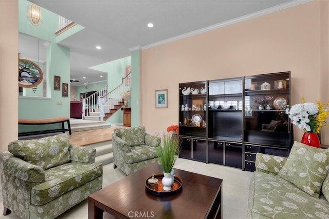 carpeted living room featuring crown molding, recessed lighting, and stairway