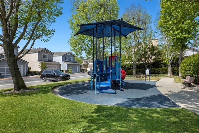 communal playground with a lawn