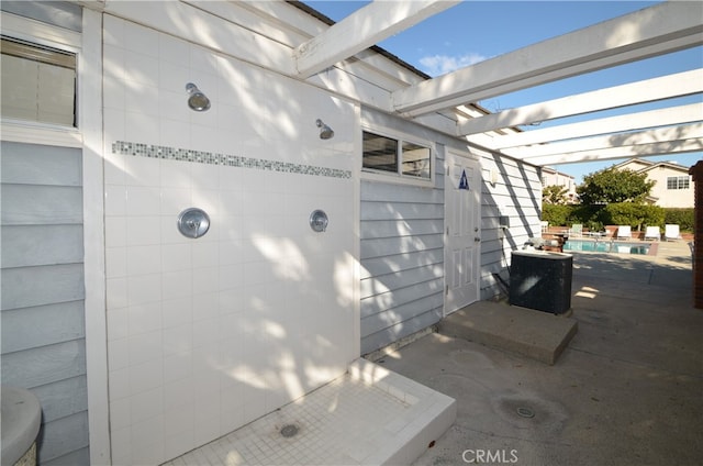 view of patio featuring a fenced in pool