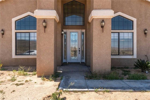 9170 Japatul Rd, Apple Valley, CA 92308 - doorway to property featuring stucco siding