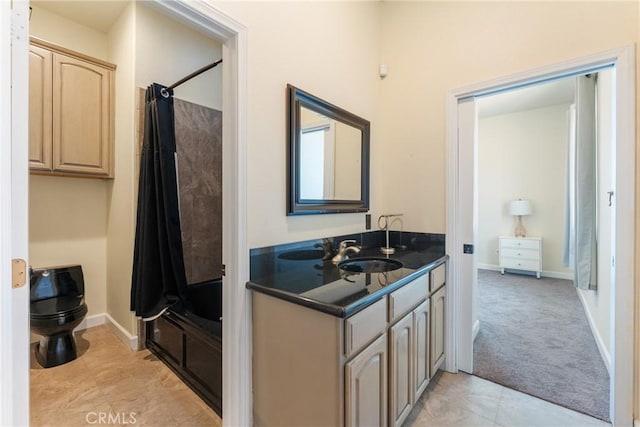 9170 Japatul Rd, Apple Valley, CA 92308 - bathroom with tile patterned flooring, shower / bath combo, vanity, baseboards, and toilet