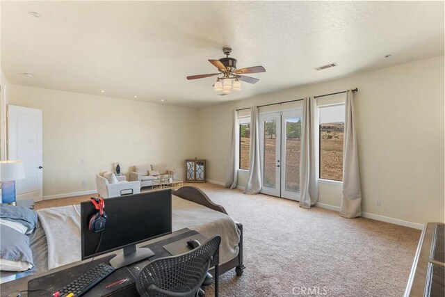 9170 Japatul Rd, Apple Valley, CA 92308 - carpeted bedroom featuring visible vents, baseboards, and access to outside