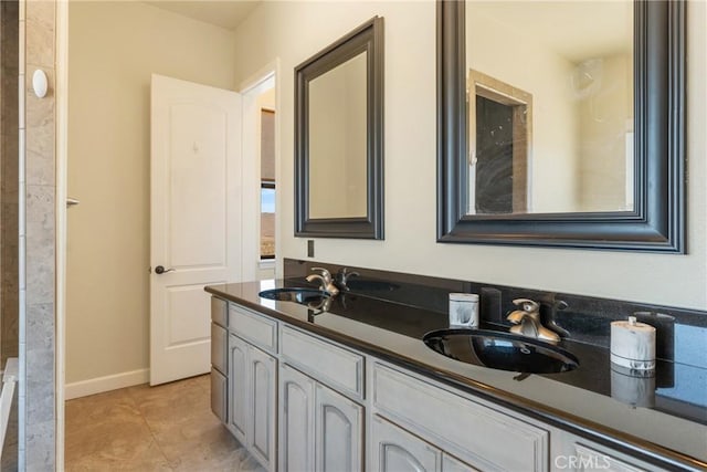 9170 Japatul Rd, Apple Valley, CA 92308 - full bath with double vanity, walk in shower, a sink, and tile patterned flooring