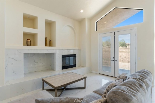 9170 Japatul Rd, Apple Valley, CA 92308 - living room featuring a high end fireplace, french doors, recessed lighting, and marble finish floor