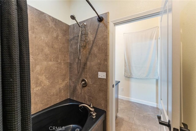 9170 Japatul Rd, Apple Valley, CA 92308 - bathroom featuring baseboards, shower / bath combination with curtain, and stone finish floor