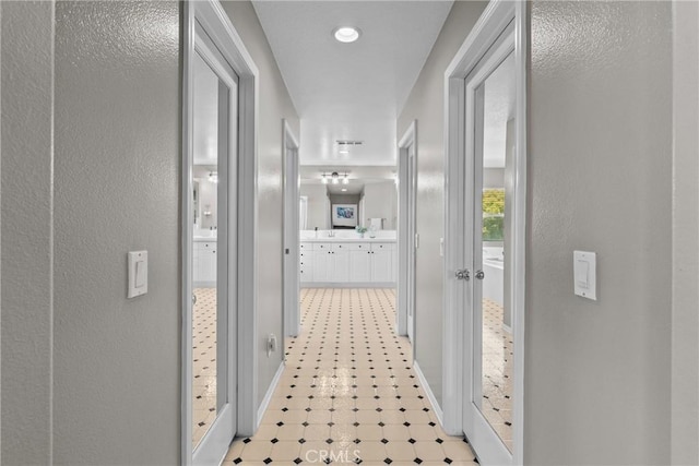 29081 Madrid Pl, Castaic, CA 91384 - corridor featuring light floors and baseboards