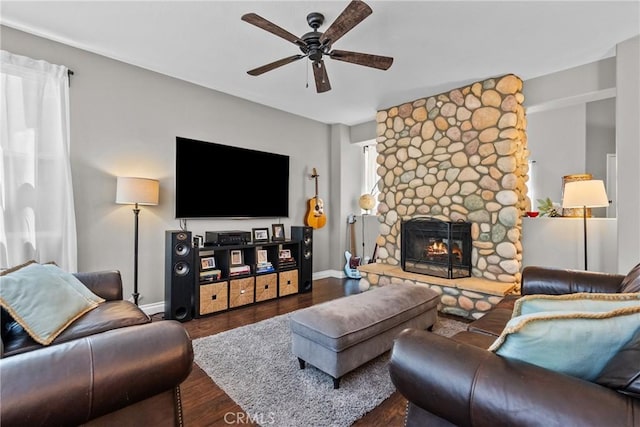 29081 Madrid Pl, Castaic, CA 91384 - living area with ceiling fan, wood finished floors, a fireplace, and baseboards