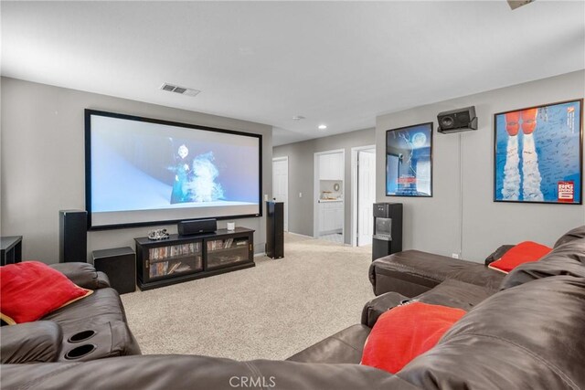home theater with recessed lighting, visible vents, and carpet