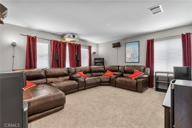 carpeted living room with visible vents