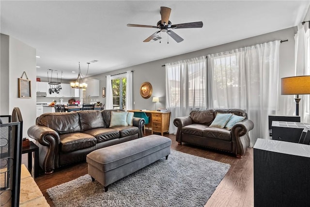 29081 Madrid Pl, Castaic, CA 91384 - living room with ceiling fan, dark wood finished floors, recessed lighting, and a chandelier
