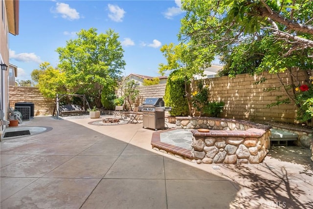 29081 Madrid Pl, Castaic, CA 91384 - fenced backyard with a fire pit, a patio area, and area for grilling