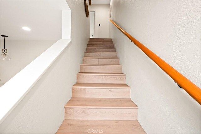 stairs with recessed lighting